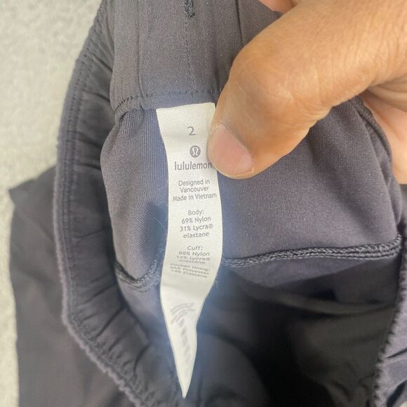 Lululemon On The Fly Jogger Pants Black Size 2 Drawstring Logo LW5cpjs - Picture 4 of 9